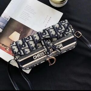 Dior Black and White Crossbody phone holder Bag
(Make Offer)